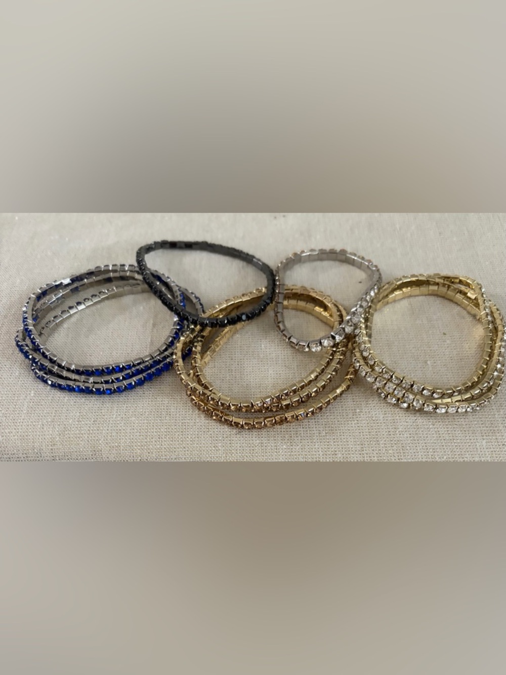 Set of 11 Rhinestone Stackable Stretch Bracelet Set.  I have added several more.